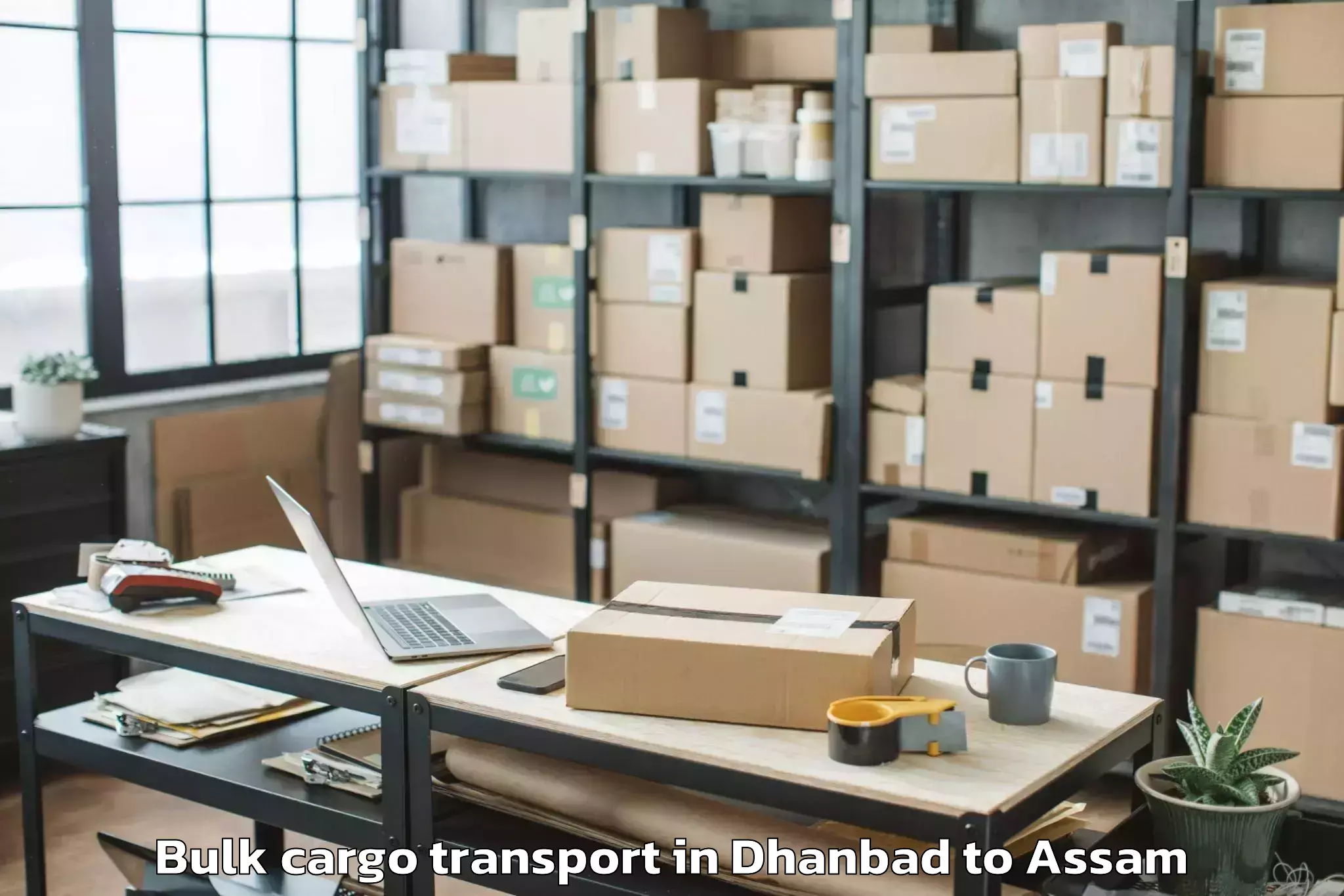 Hassle-Free Dhanbad to Baganpara Pt Bulk Cargo Transport